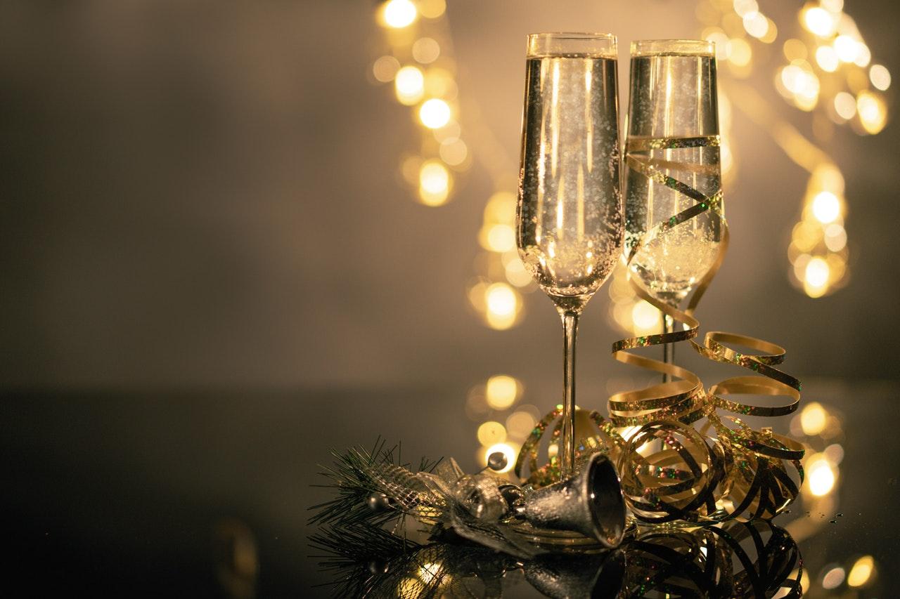 close-up-of-two-flute-glasses-filled-with-sparkling-wine-3036525.jpg