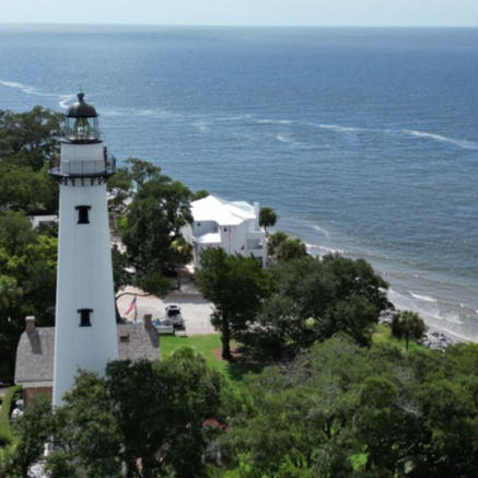 St. Simons Island Lighthouse near the shoreline in the Golden Isles